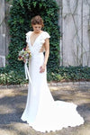 Mermaid V-Neck Cap Sleeves Backless Wedding Dress With Ruffles